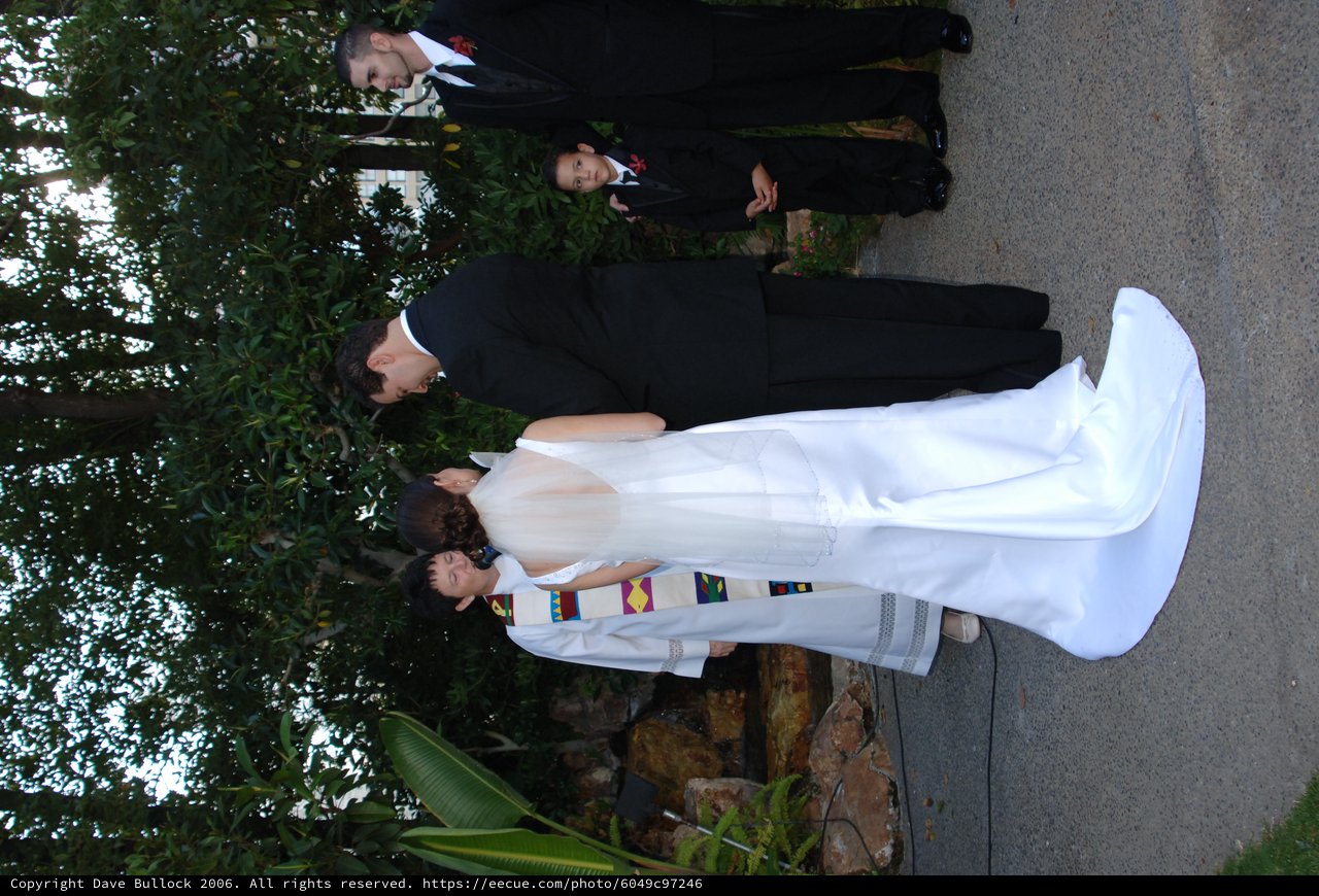 Outdoor Wedding Ceremony Beneath Lush Garden Canopy