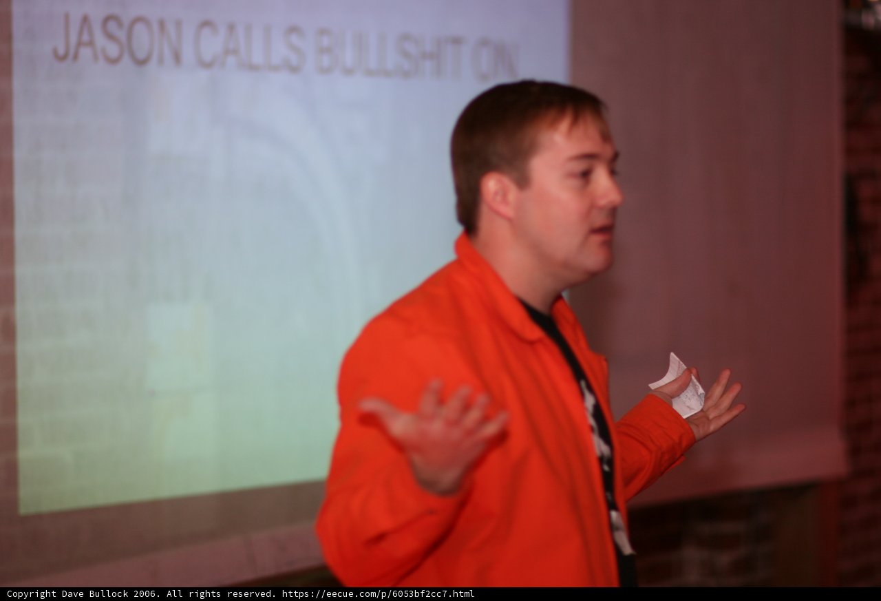 Orange-Jacketed Presenter at Barcamp 3
