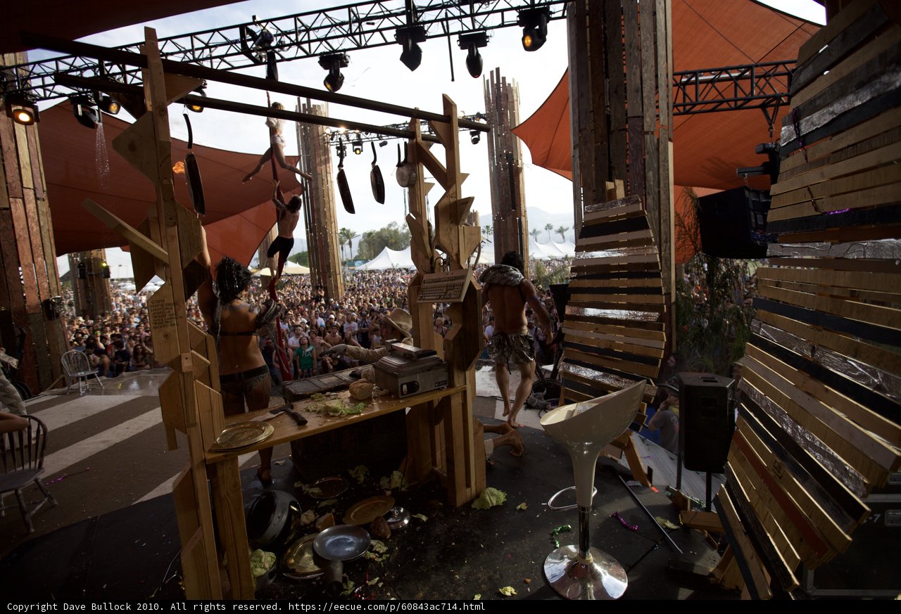 Wooden Stage and A Crowded Audience