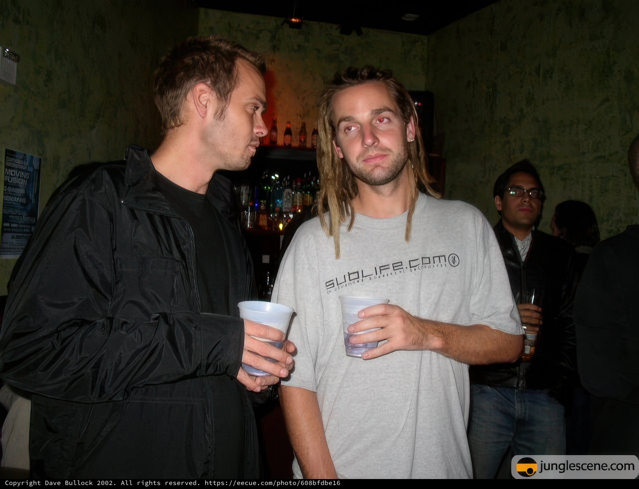 Two Men Enjoying a Drink at the Pub