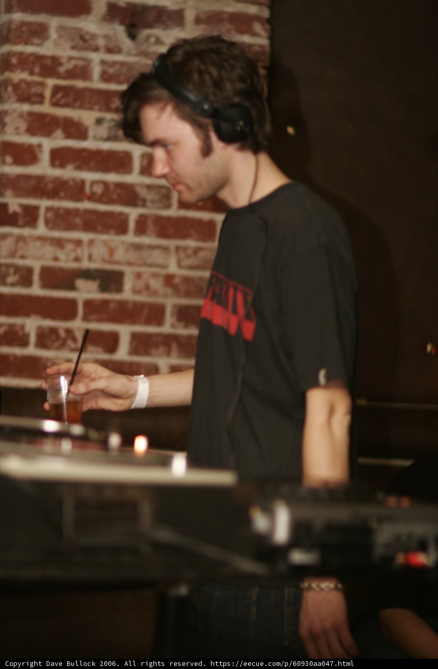 Deejay Entertains Crowd at Local Bar