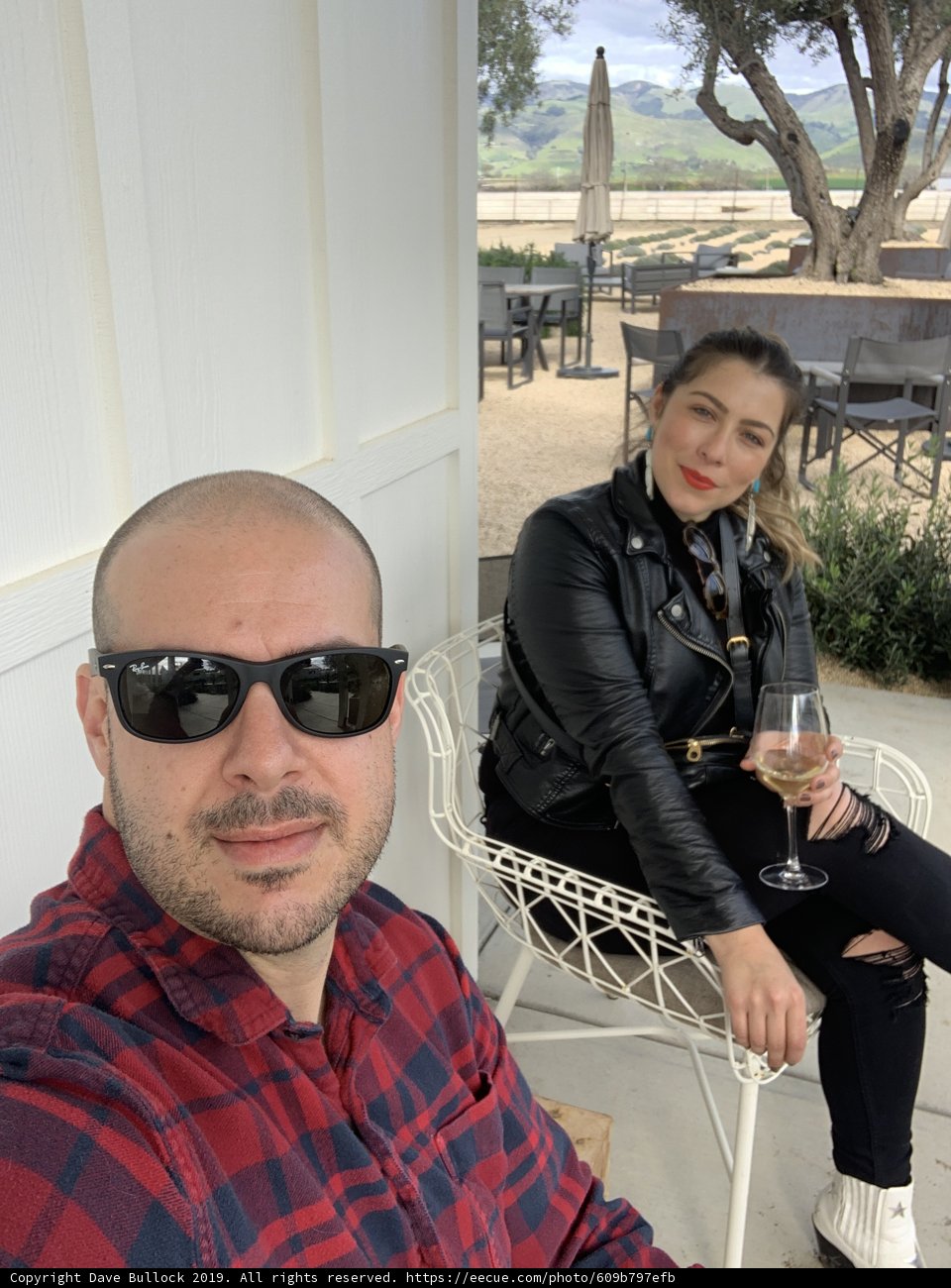 Couple Enjoying a Sunny Afternoon at a Outdoor Table