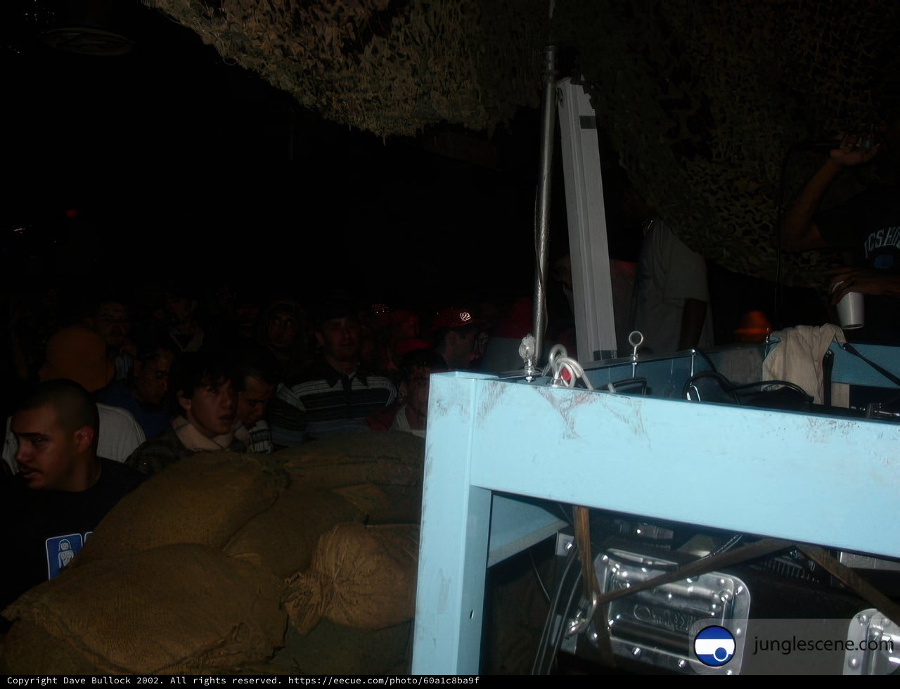 Man Presents TV to a Crowd