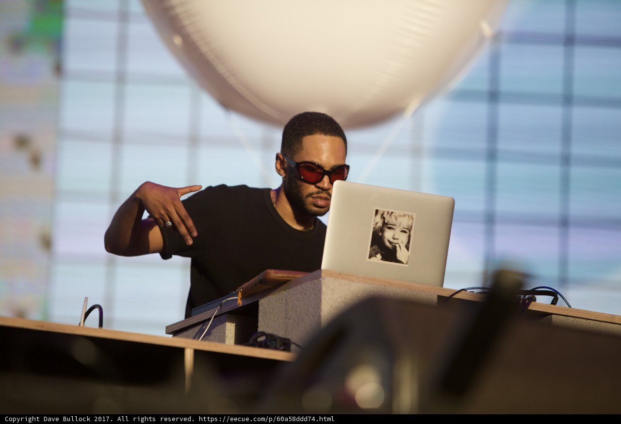 Kaytranada spinning beats on his trusty laptop