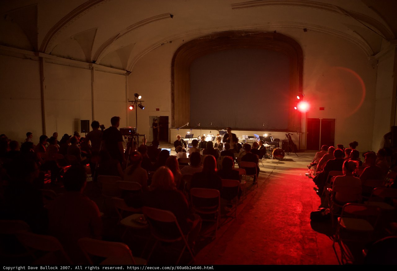 A Captive Crowd in Red Light