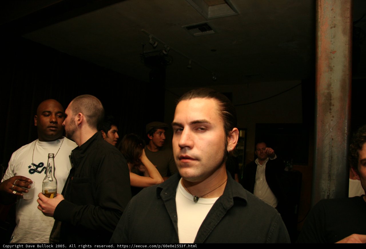 Black Shirt in a Crowded Pub