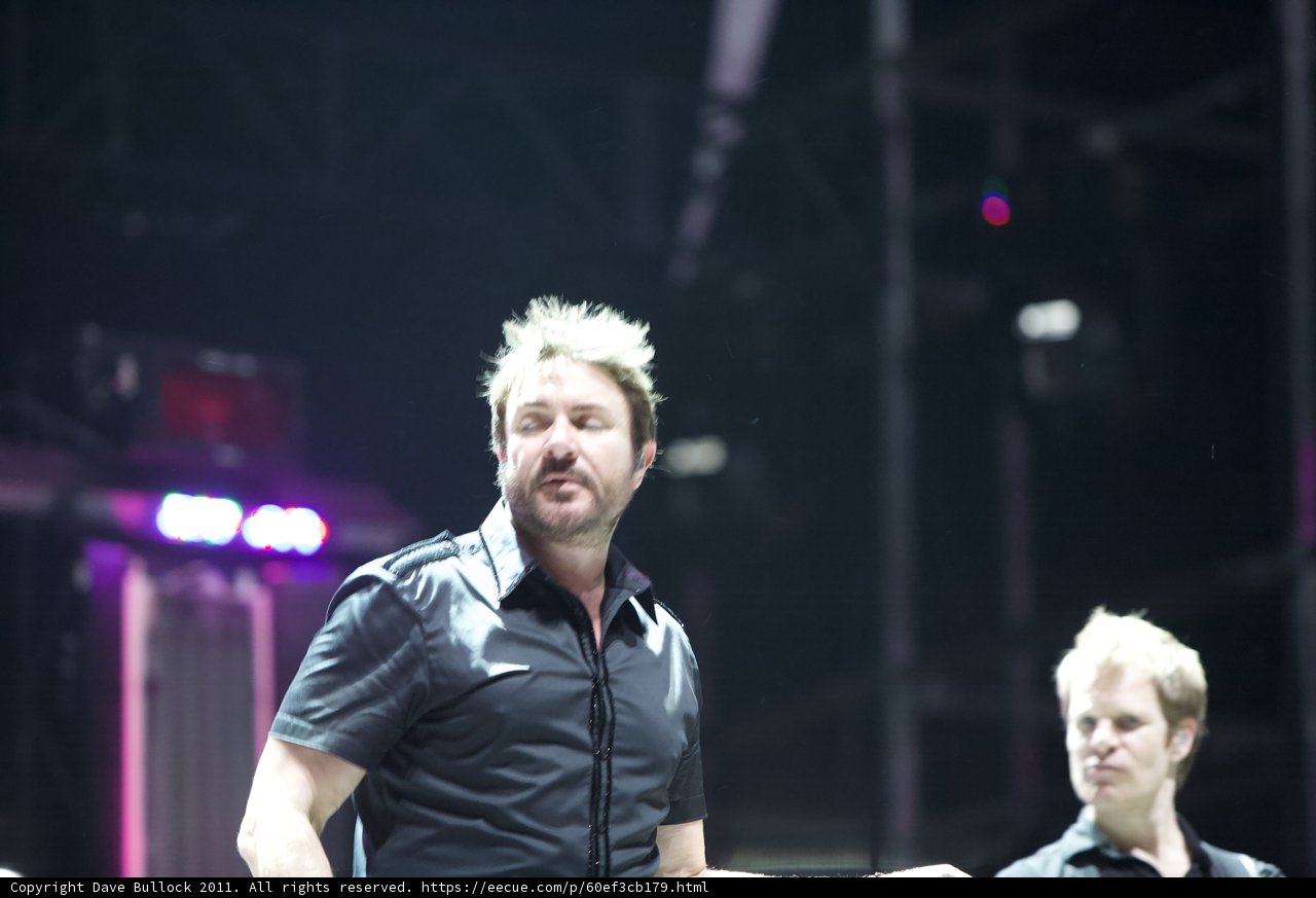 Two Men in Black Shirts Take the Stage at Coachella 2011