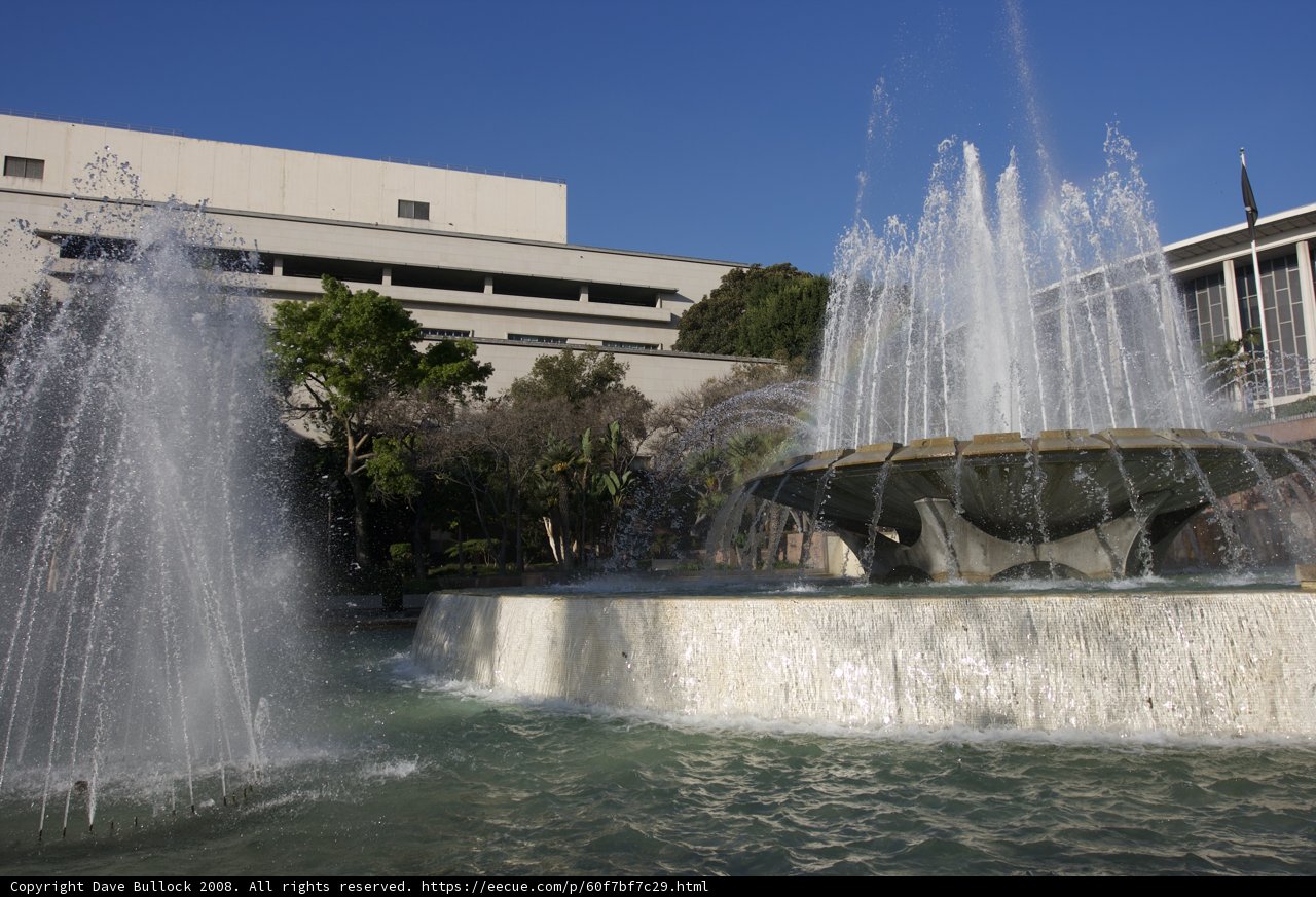 Majestic Fountain in front of Architecture