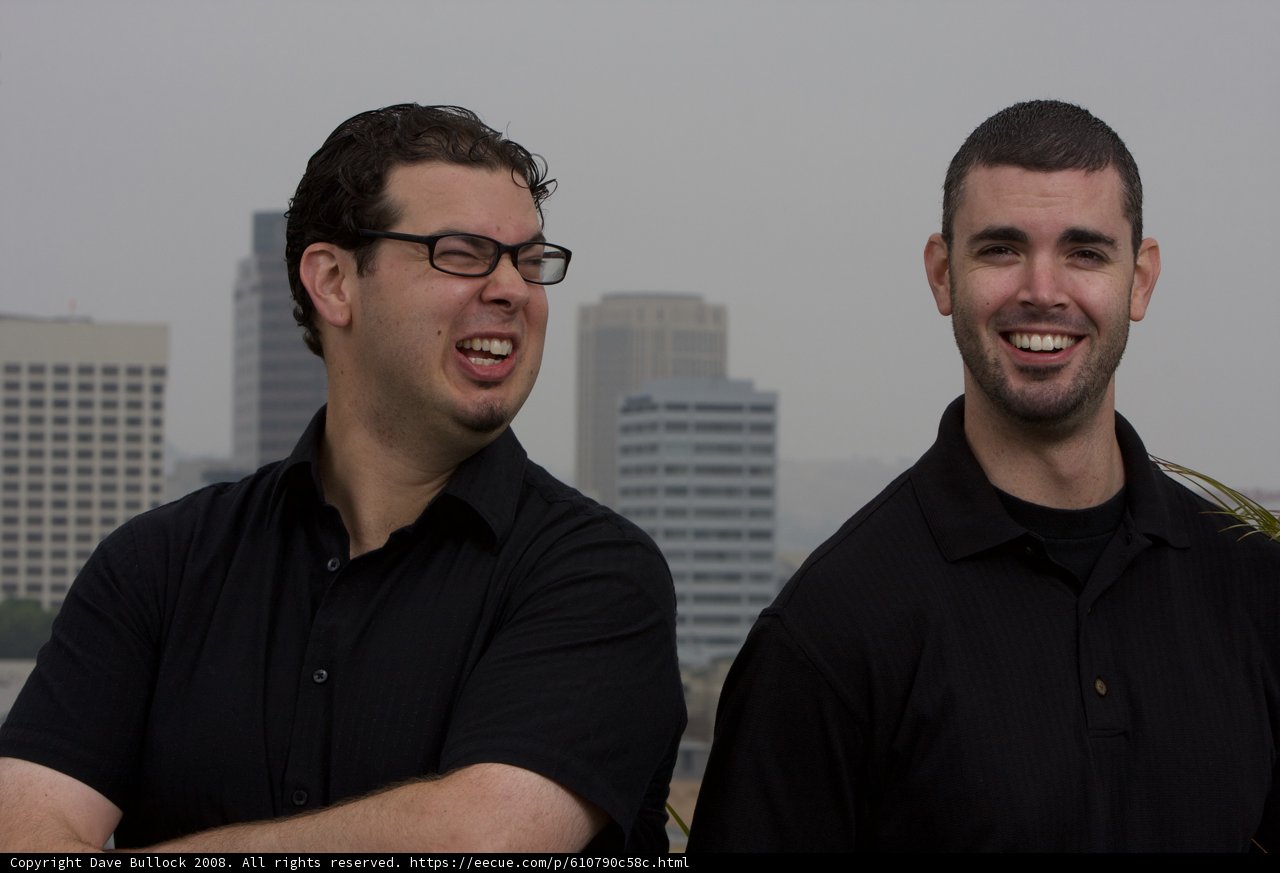 Two Happy Men with Glasses