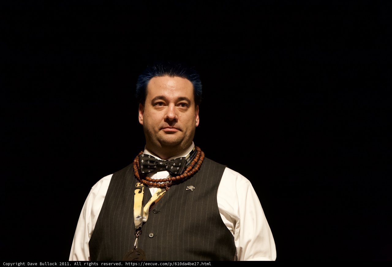 Blue-haired Vest-wearing Man