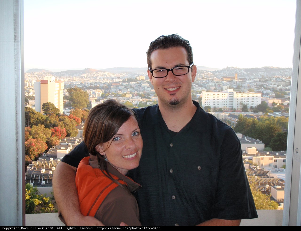 Couple Embracing with San Francisco Cityscape Behind