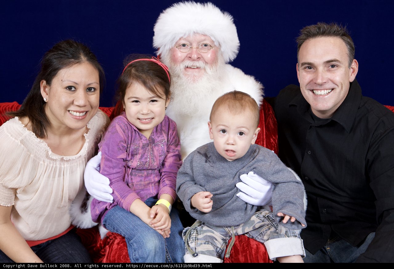 Family Christmas Photo with Santa Claus