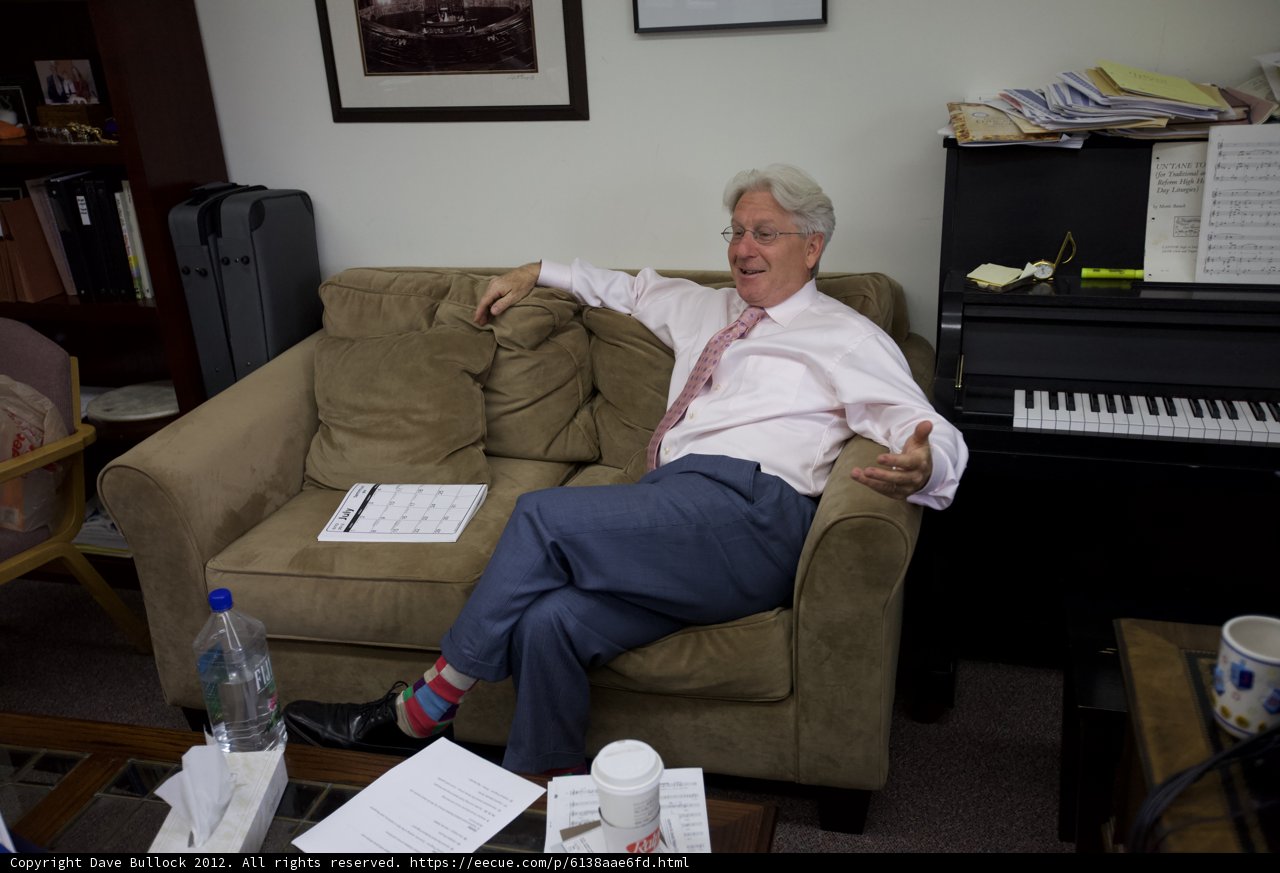The Pink-Tied Gentleman on His Living Room Couch
