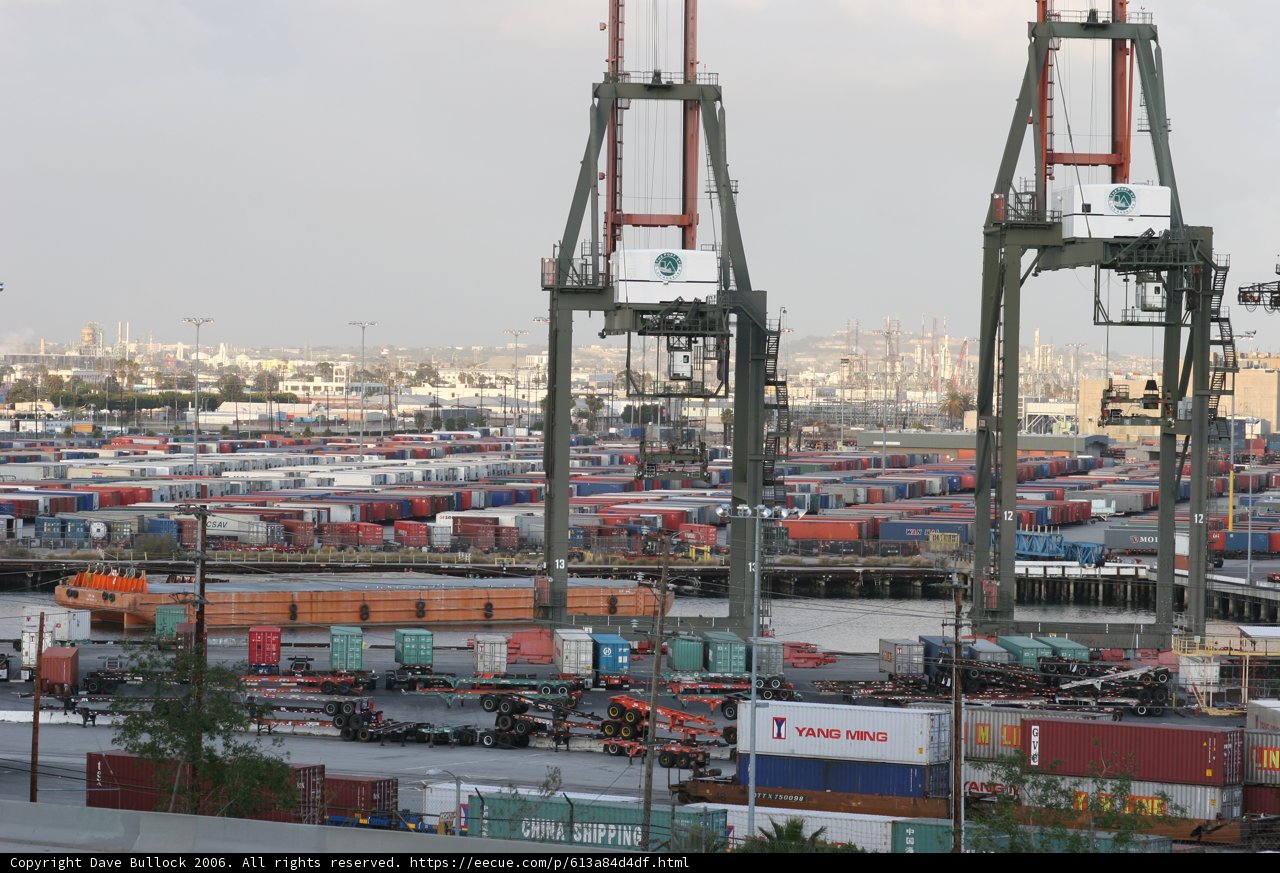 Towering Crane at the Busy Port