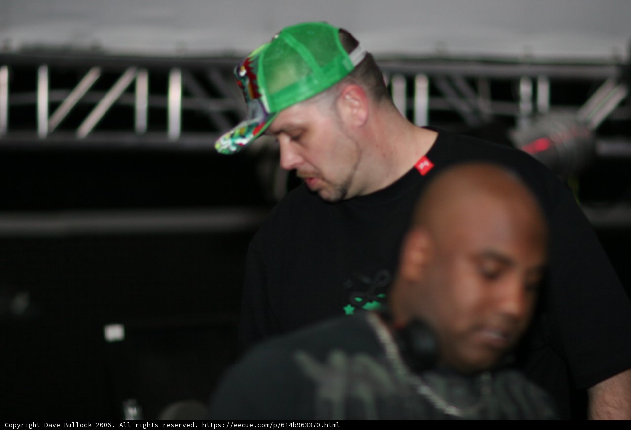 Green Hat, Black Shirt