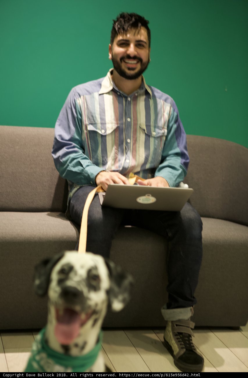 Man and Dog Lounging on Couch