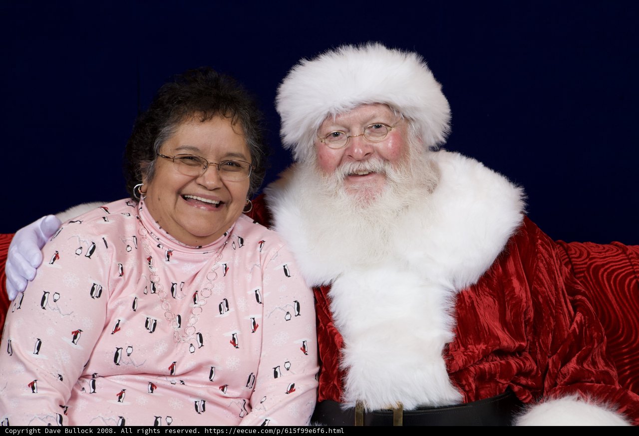 Mr. and Mrs. Claus at the APC Xmas Party