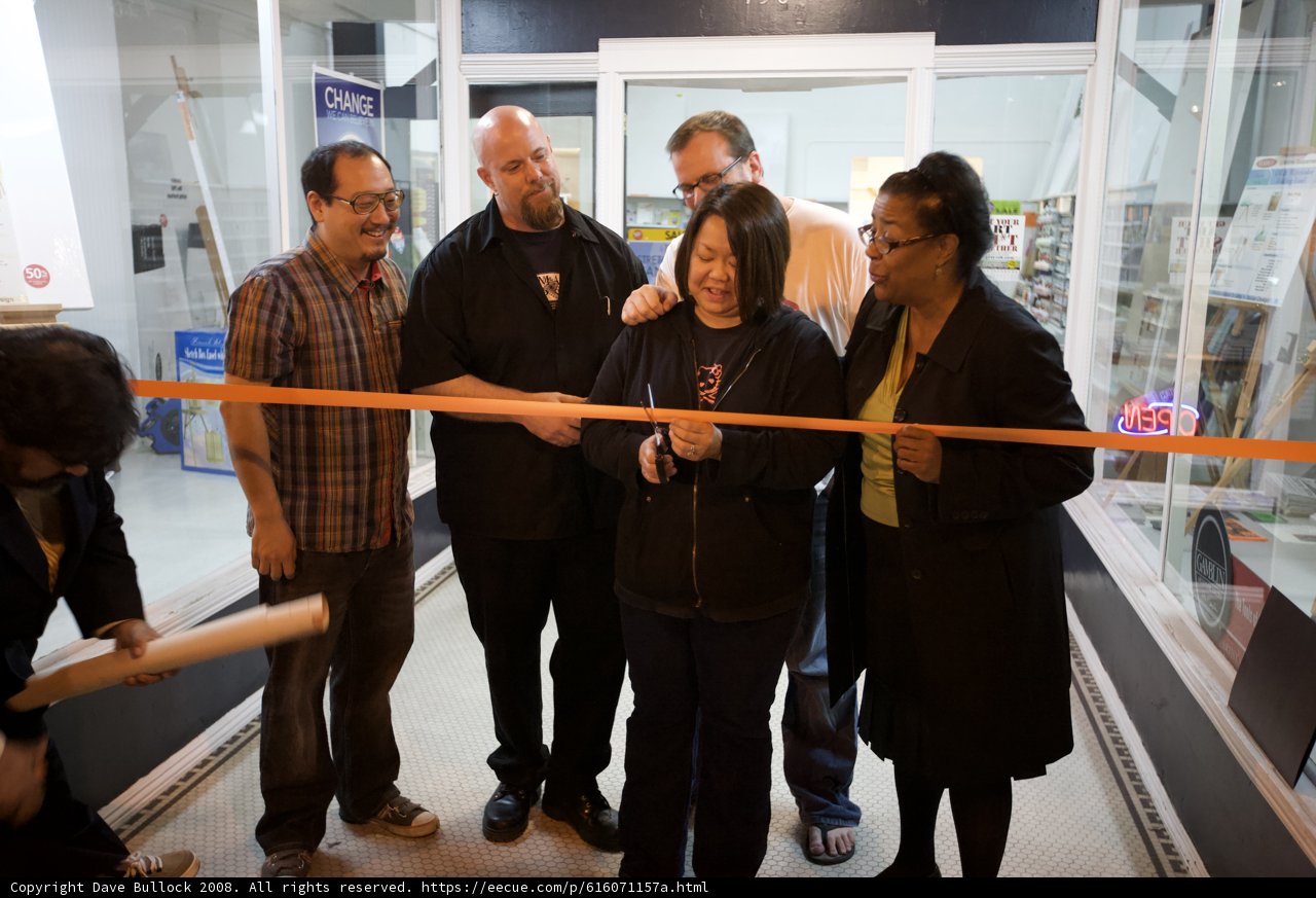 Ribbon cutting ceremony at new clothing store