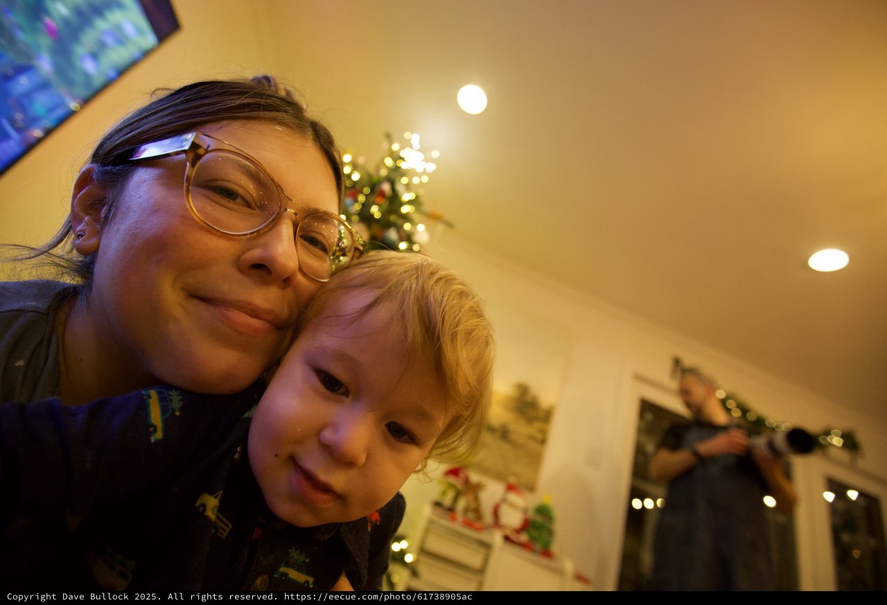 Christmas Eve Selfie: Parent and Child Share a Cozy Moment
