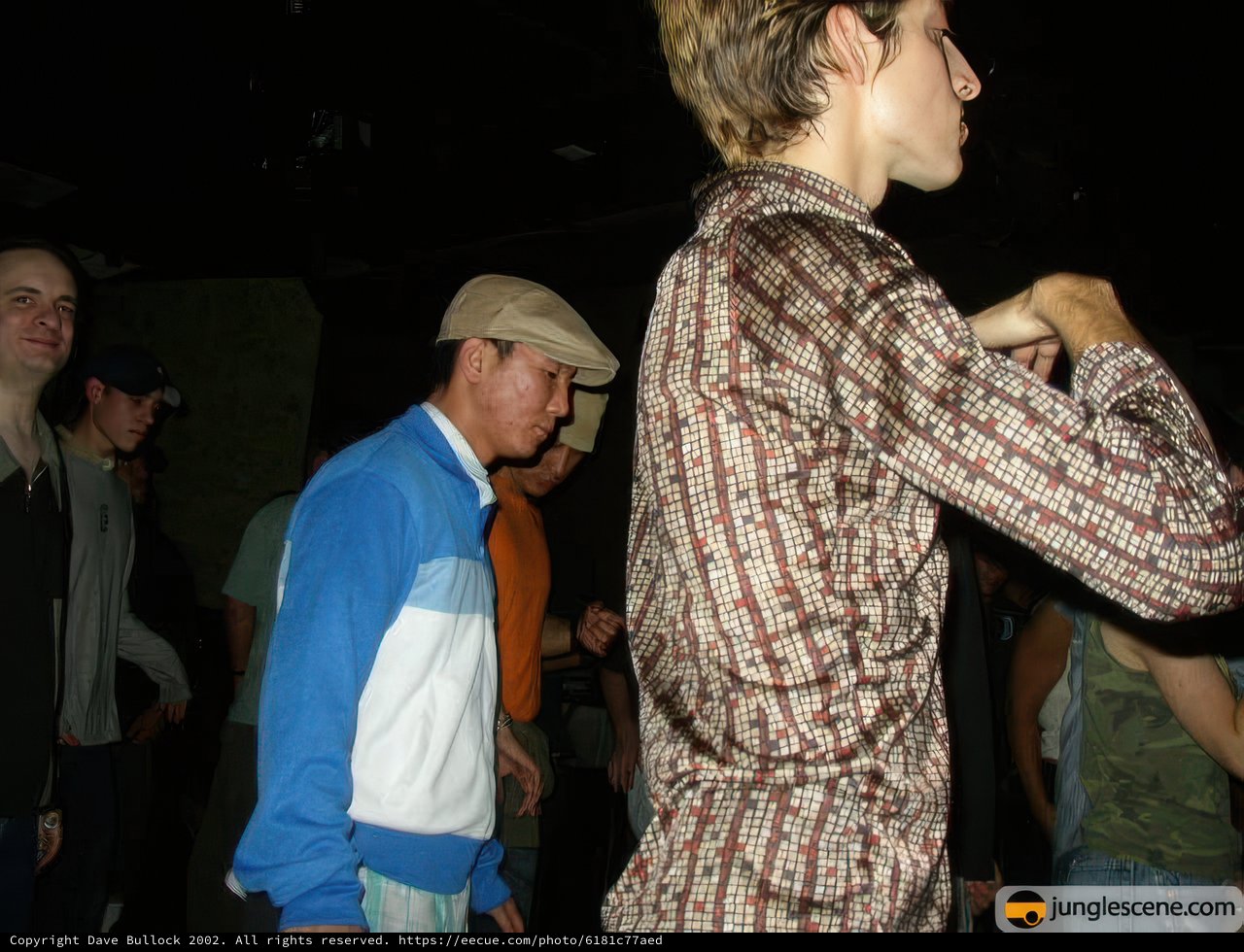 Two Men in Hats at Party