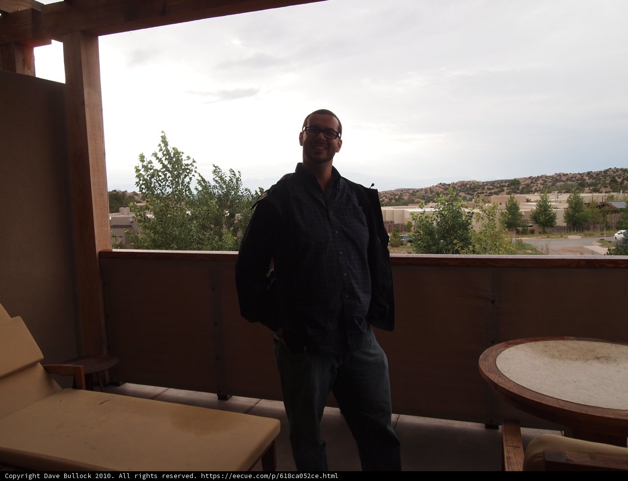 Man on a Plywood Balcony