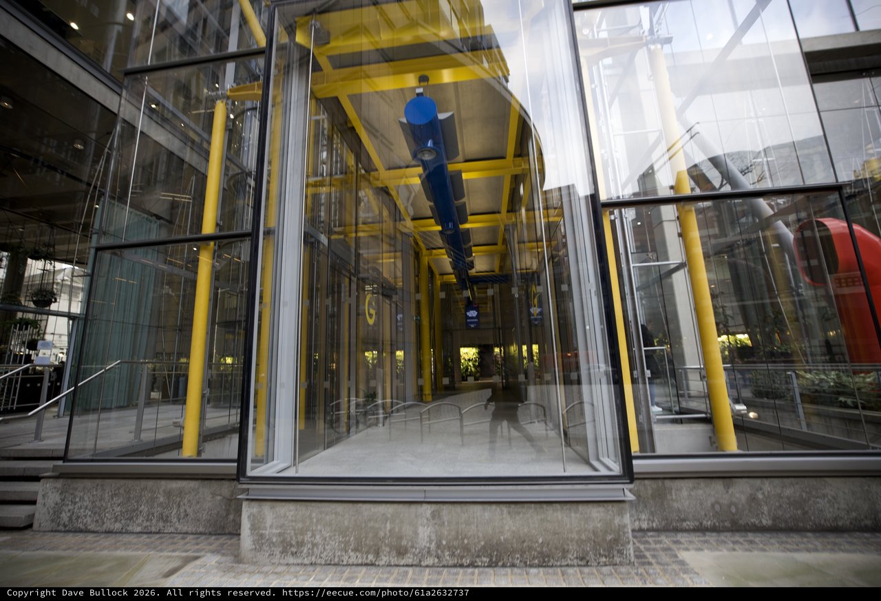 Transparent Glass Elevator Shaft in Modern London Building