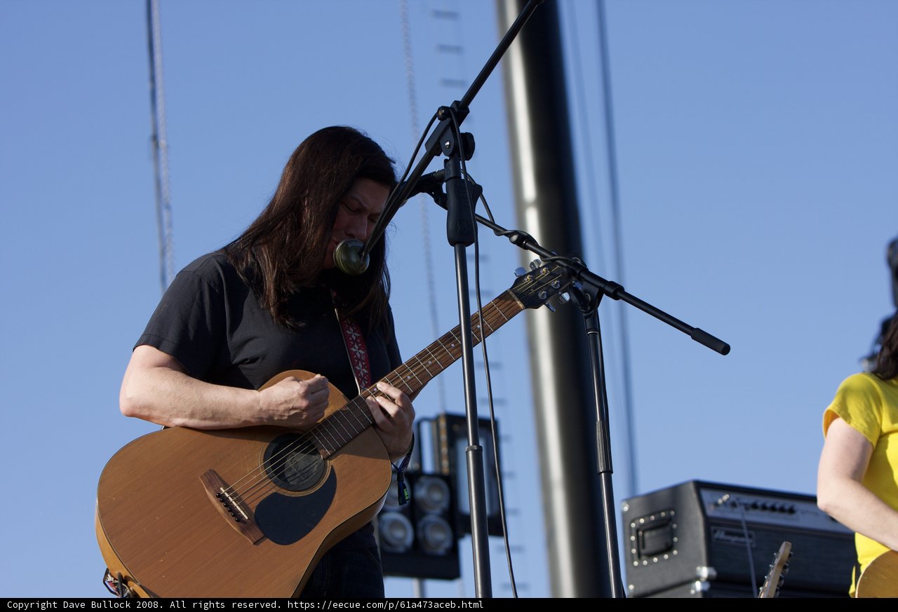 Coachella Performer Kim Deal Plays Guitar and Sings Under Blue Skies