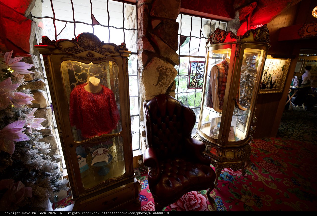 Vintage Christmas Display with Ornate Curio Cabinets