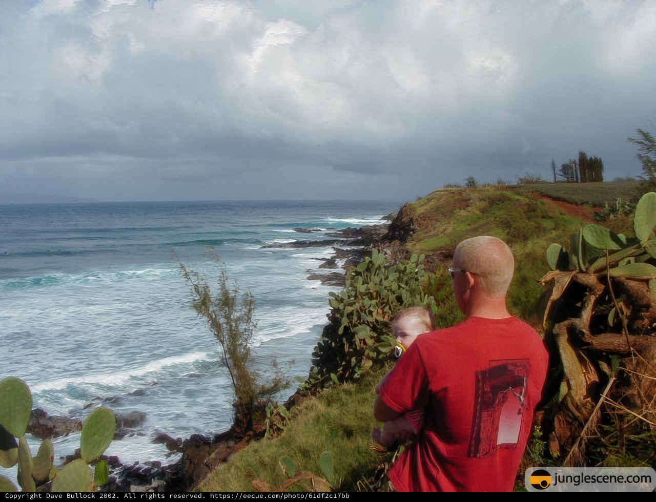 Man and Child Gazing at Cloudy Ocean View