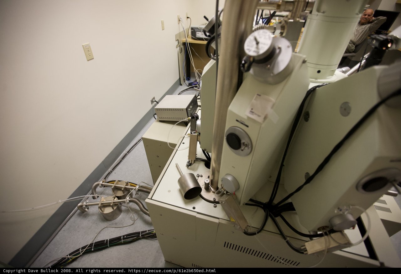 Man operating a machine in a laboratory