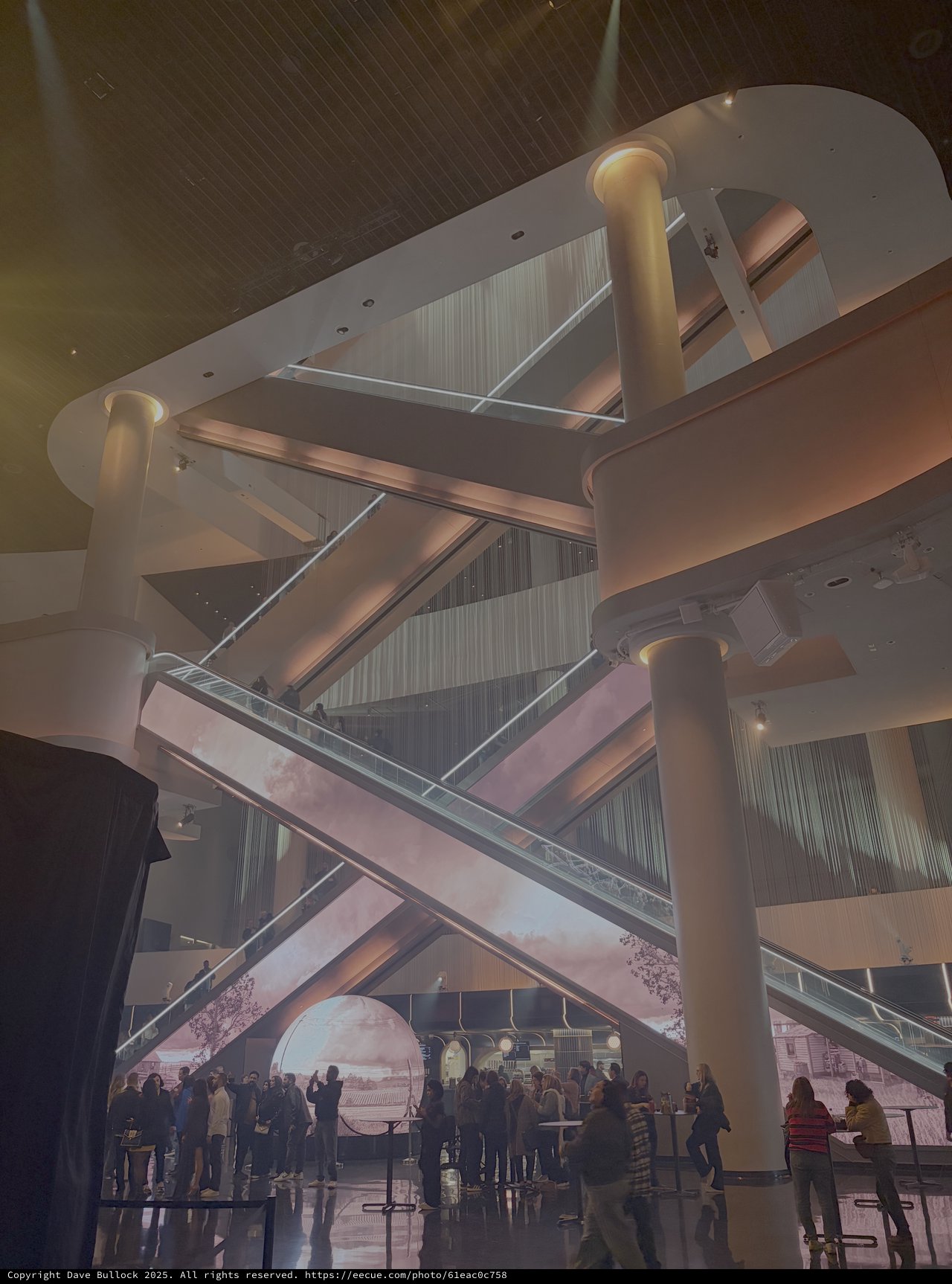 Futuristic Museum Interior with Crowd