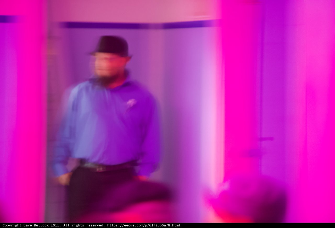 Man in Purple Room