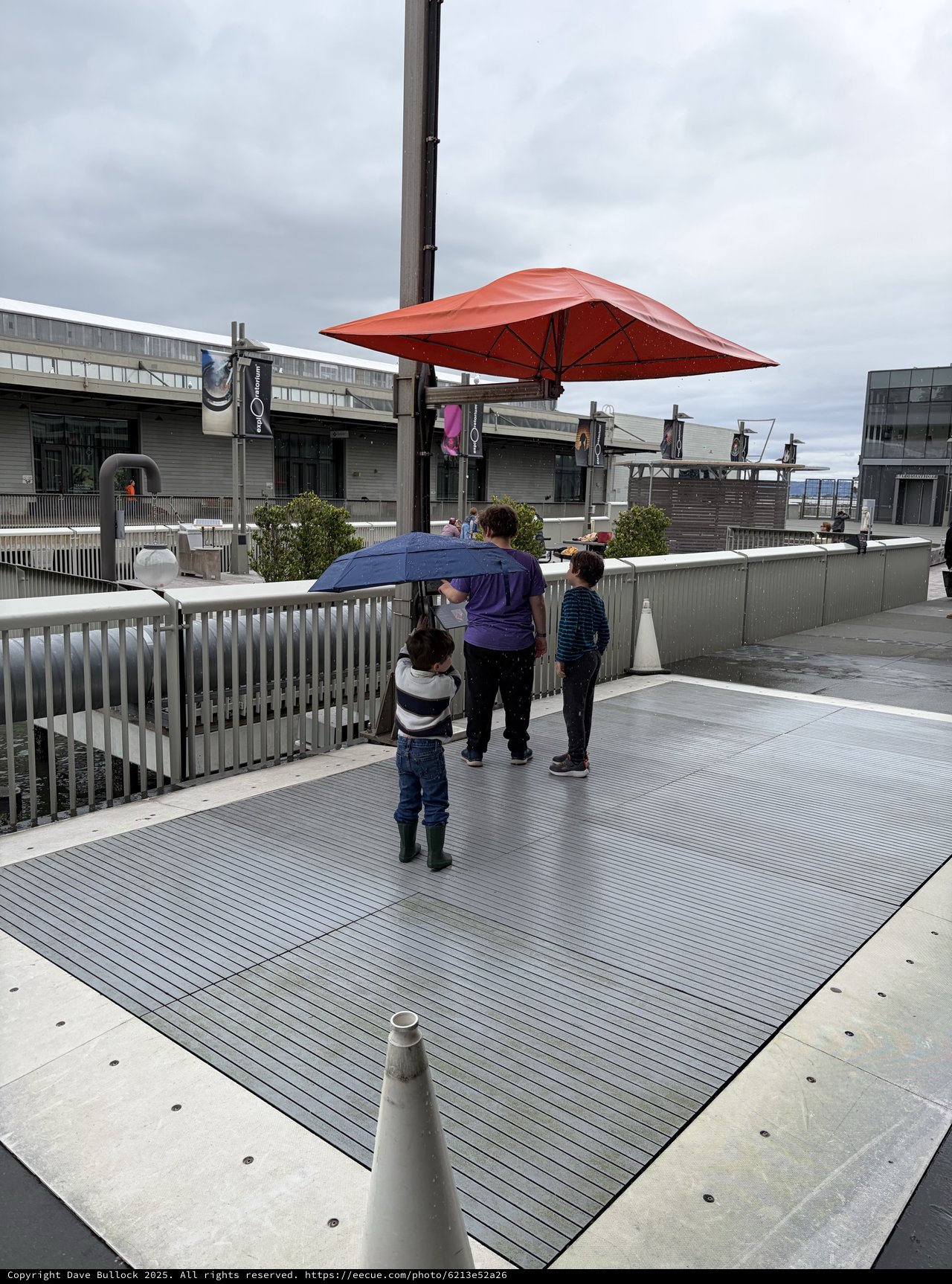 Family Moment on Modern Urban Rooftop Terrace
