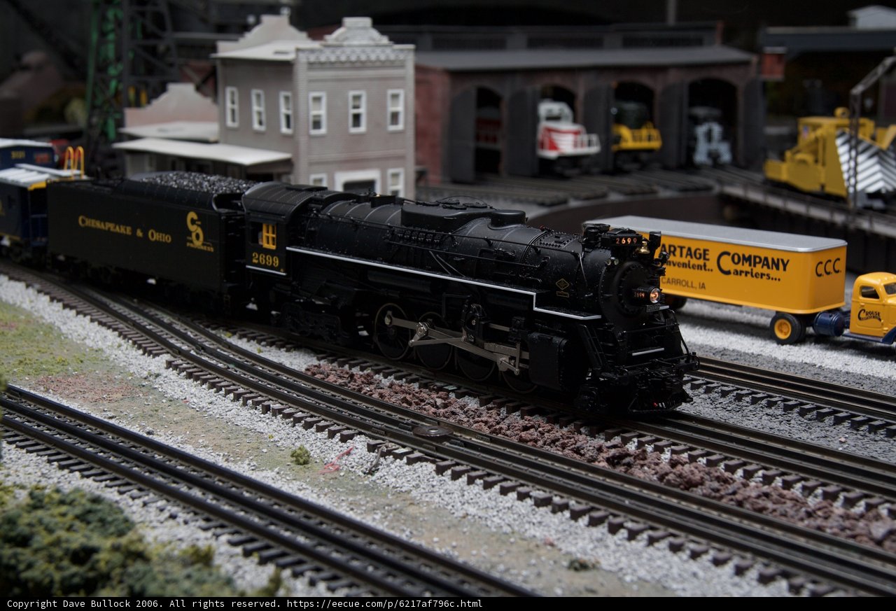 Miniature Train on Railroad Track