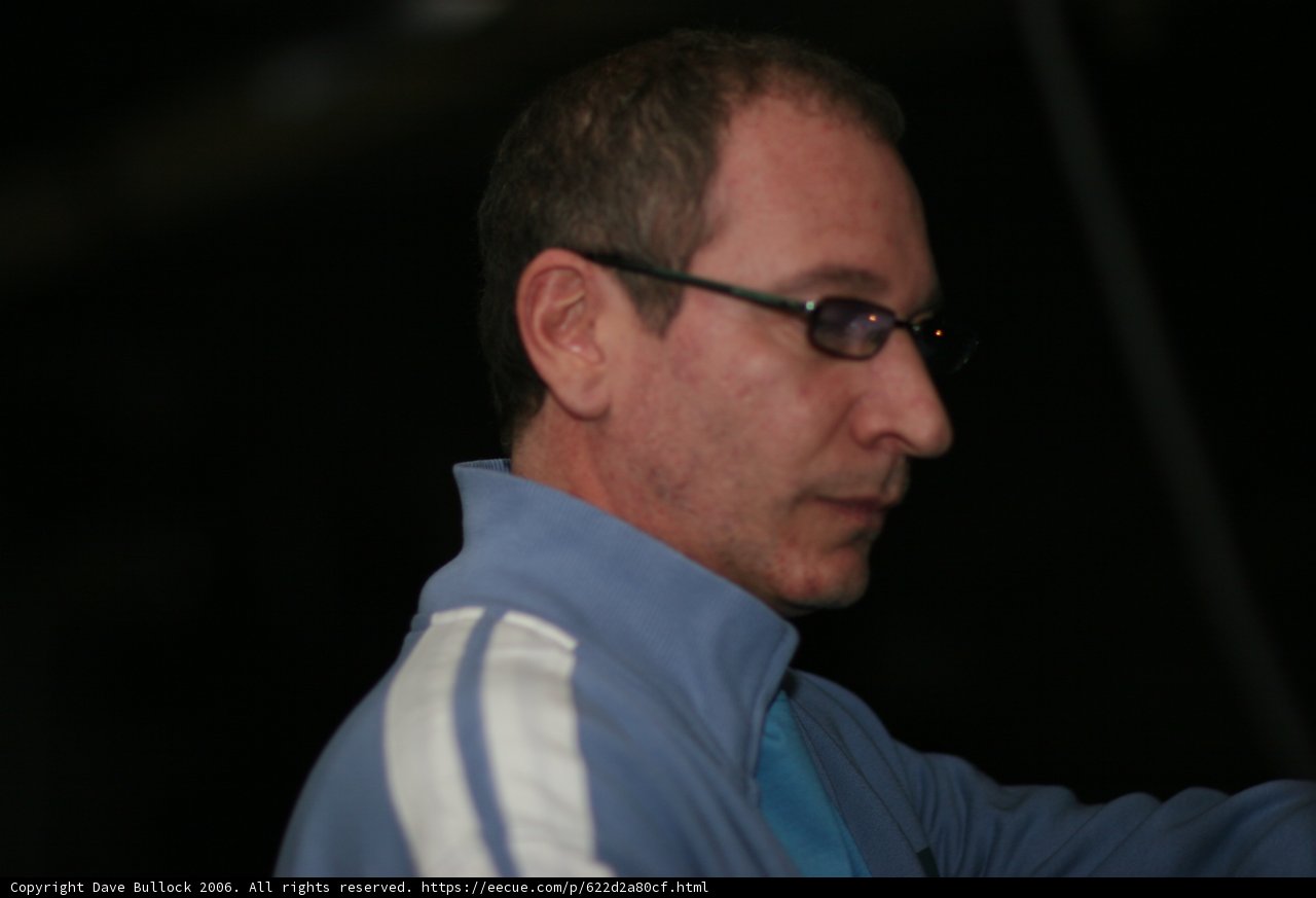 Formal Portrait of a Man in Glasses and Blue Jacket