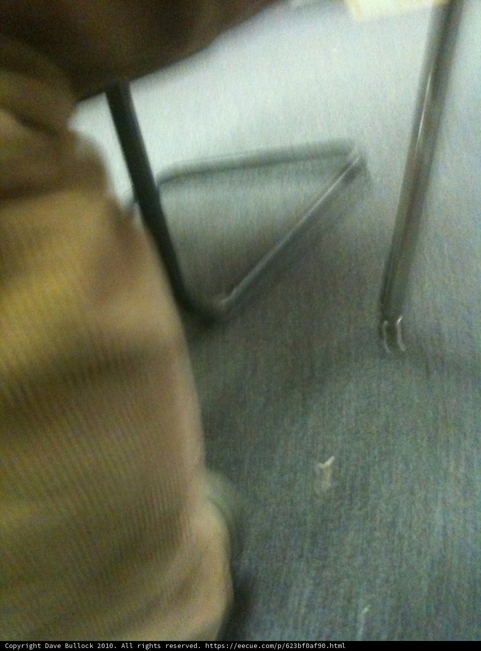 Blurry Seated Figure