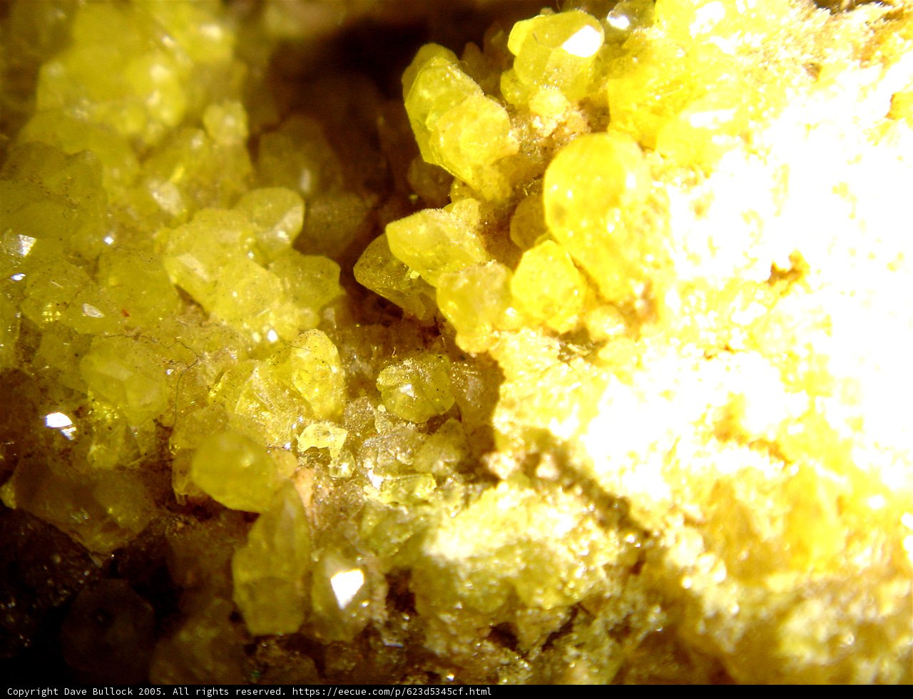 Yellow Quartz Crystals on Rock