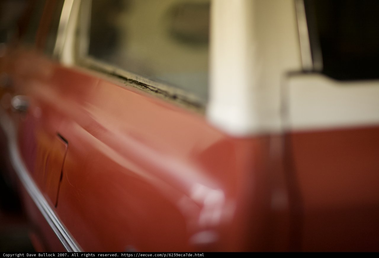 Vintage Red Car with Spoke Wheels