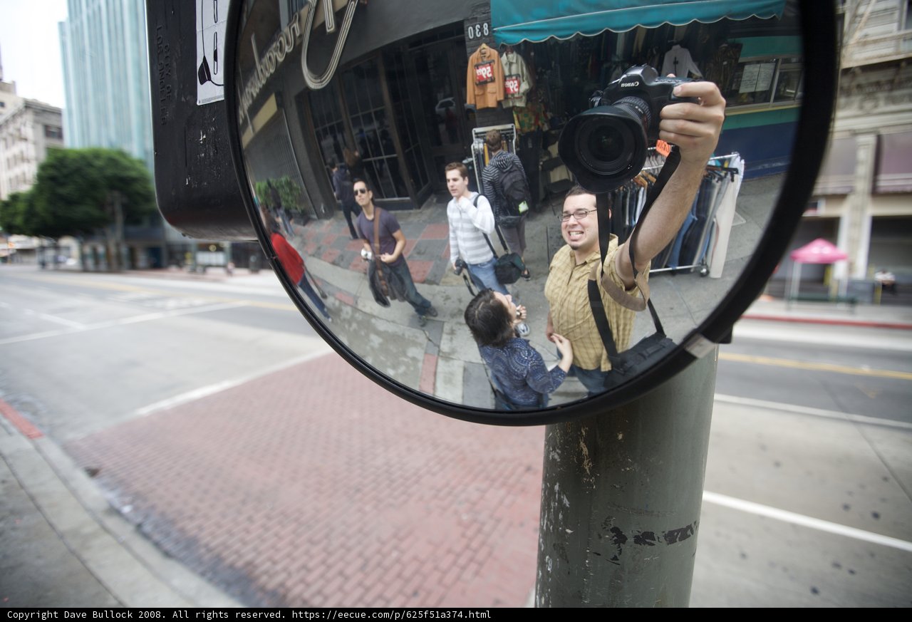 Reflections of a Photographer Capturing a Moment