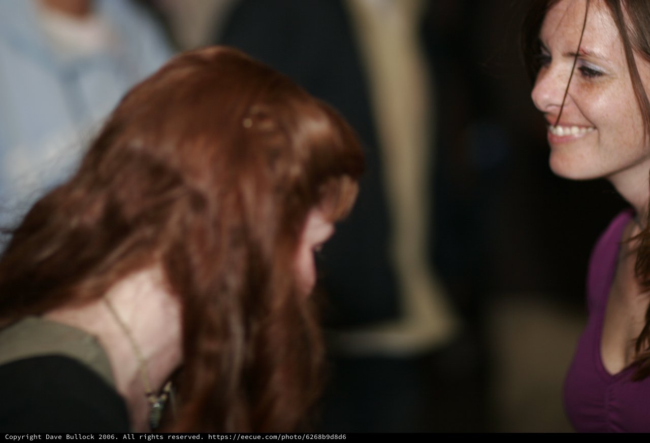 Two Women Share a Joyful Moment Together