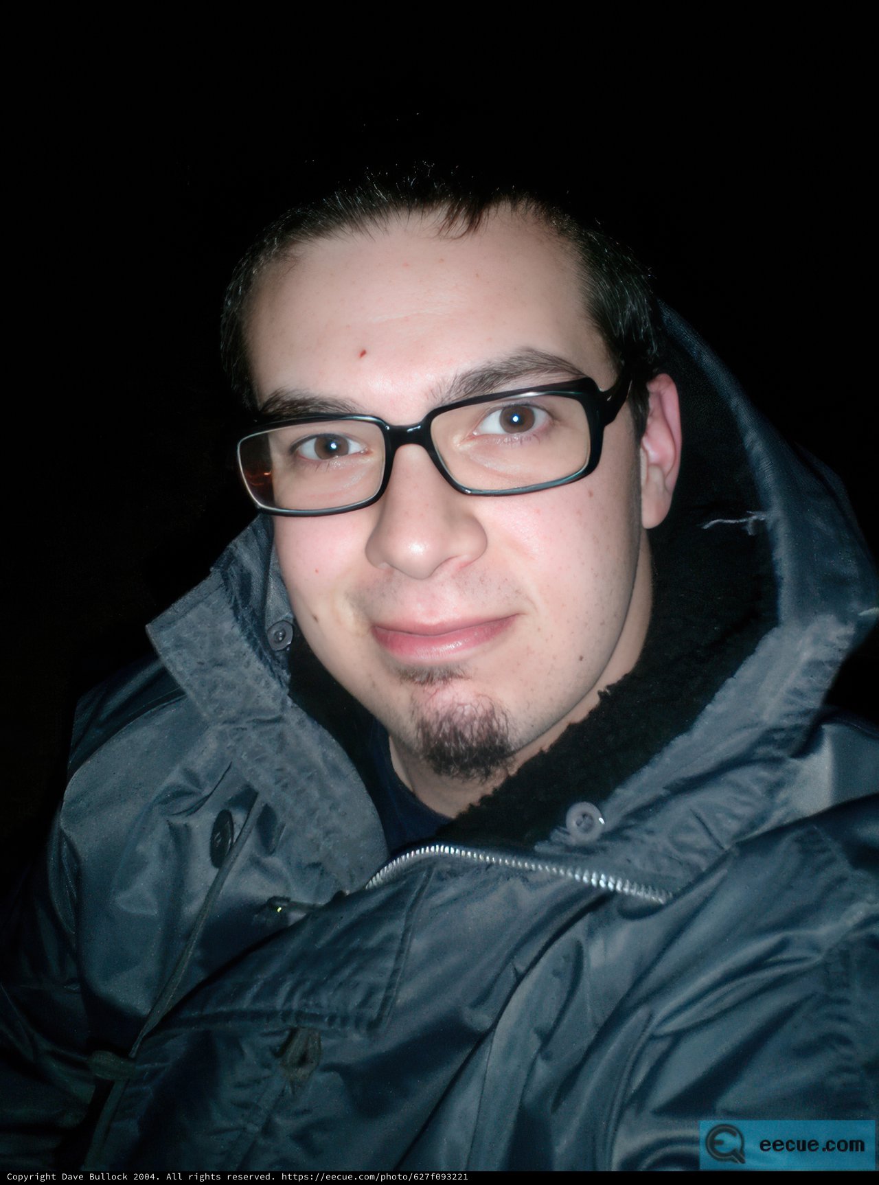 Dave B's Portrait in a Stylish Jacket and Glasses