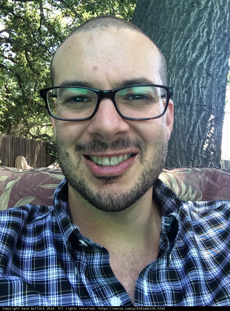 Glasses, Plaid, and a Smile