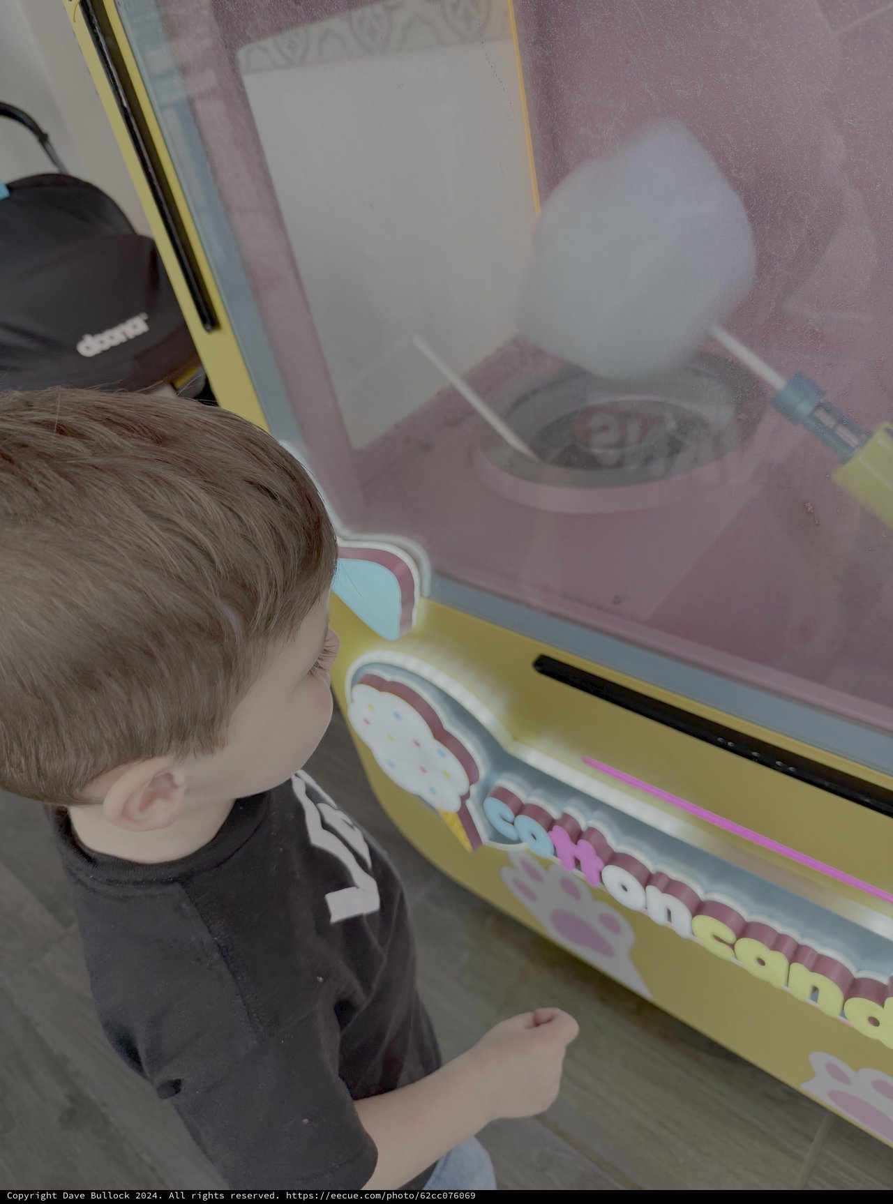 Child Playing Arcade Cotton Candy Game