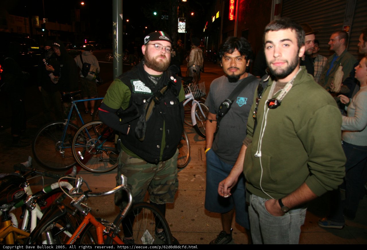 Green Jacketed Man on a Bicycle