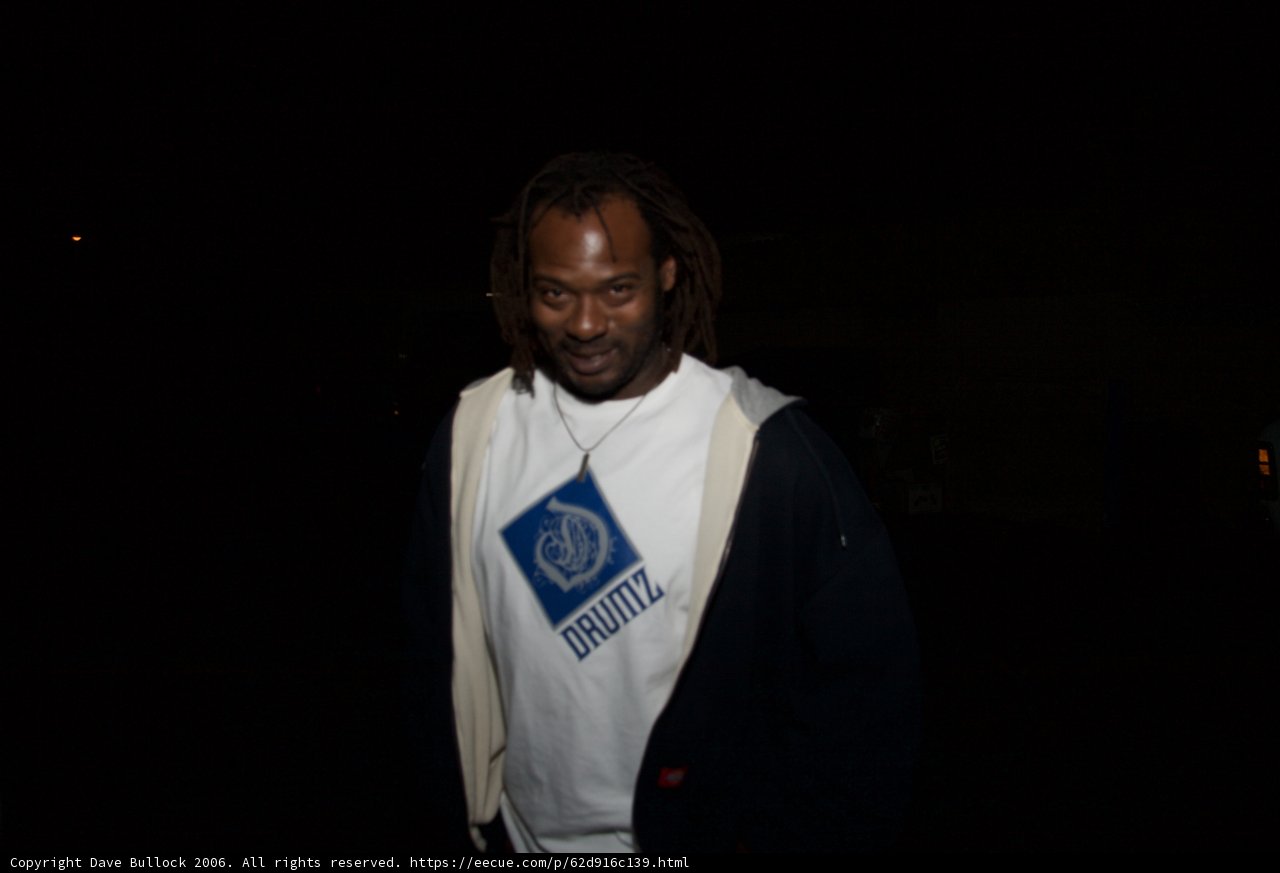 White T-Shirt and Dreadlocks