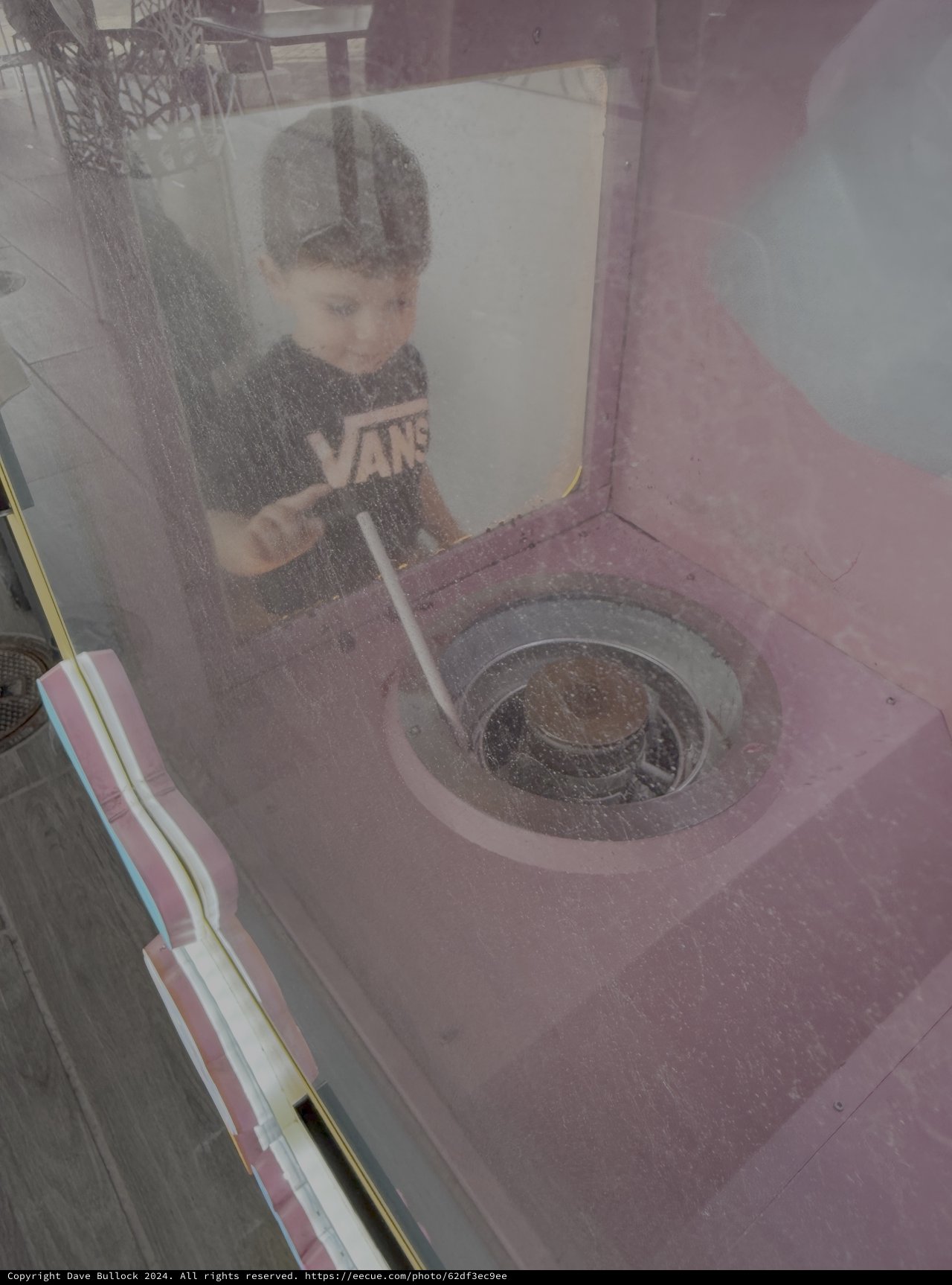 Child Operating Interactive Science Museum Exhibit