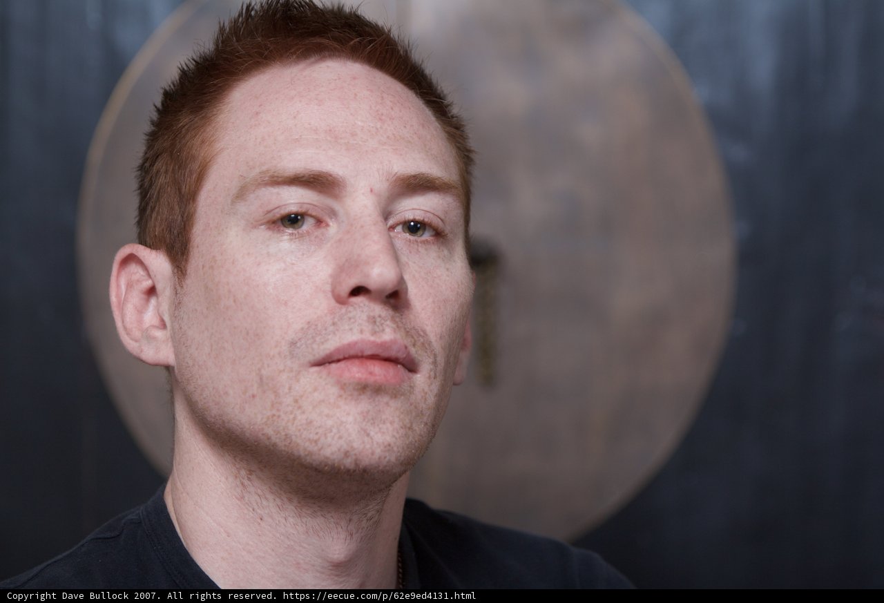 Red-haired Man Grinning from Ear to Ear
