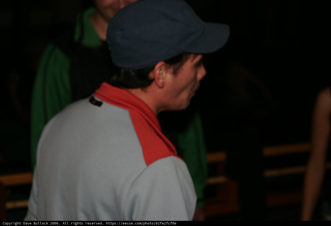 Cap-Savvy Man in Pub
