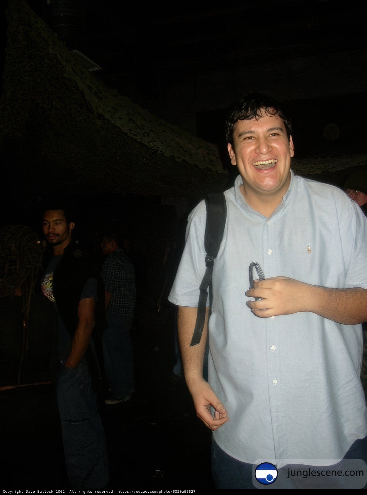 Smiling Man in Urban Nightlife