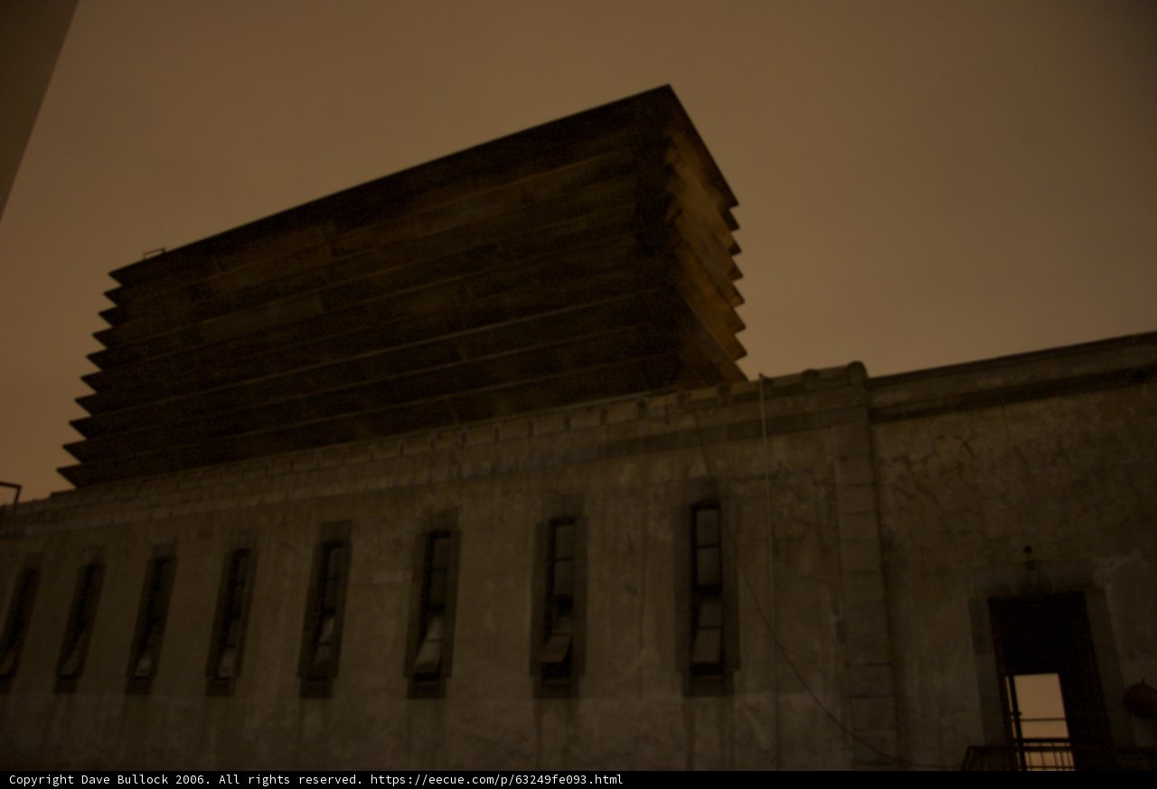Midnight Glimmers through Towering Window